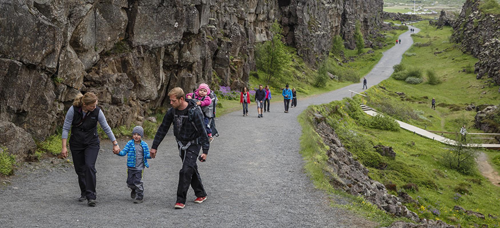 Family hiking in a park.