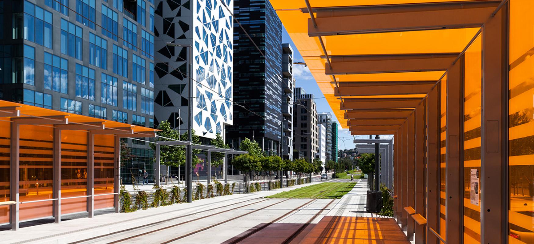 Orange glass at a tram station in Bjørvika, Oslo.