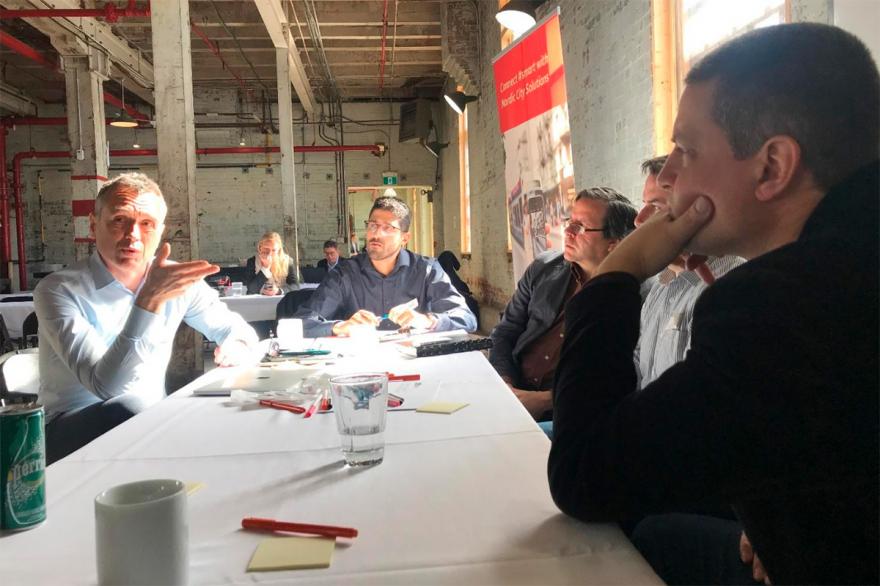 Danish architect Kolja Nielsen of CEBRA Architects discusses sustainability with property developer Scott Demark from Zibi in Ottawa.