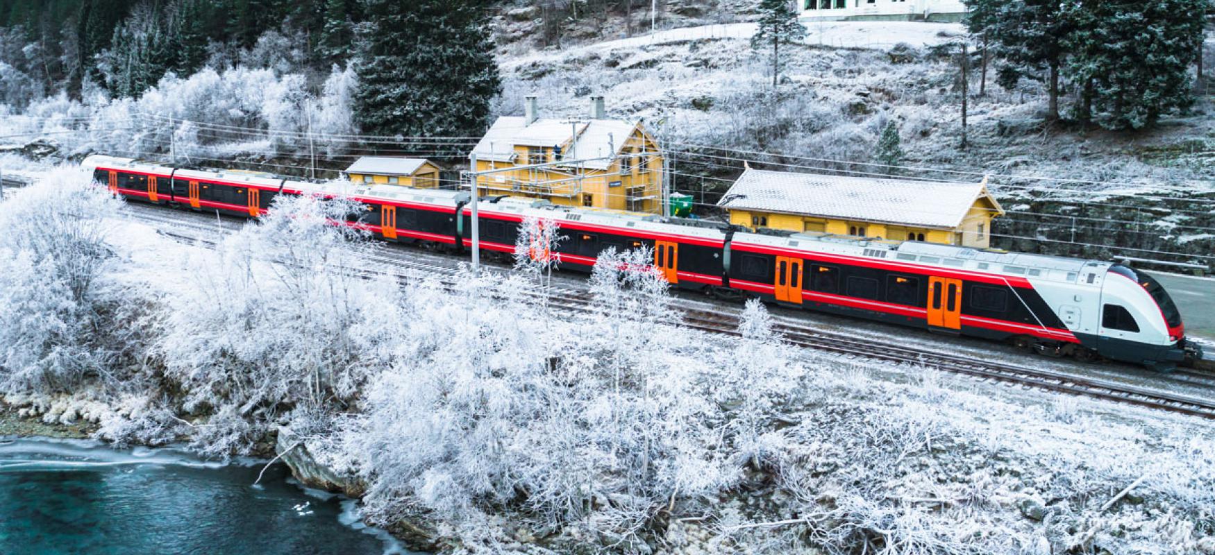 Norwegian train in winter landscape