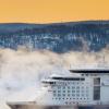 Cruise ship sailing near land in Norway